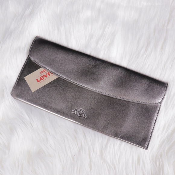 Levi's Handbags - NWT Levi's Silver Leather Clutch ✨
